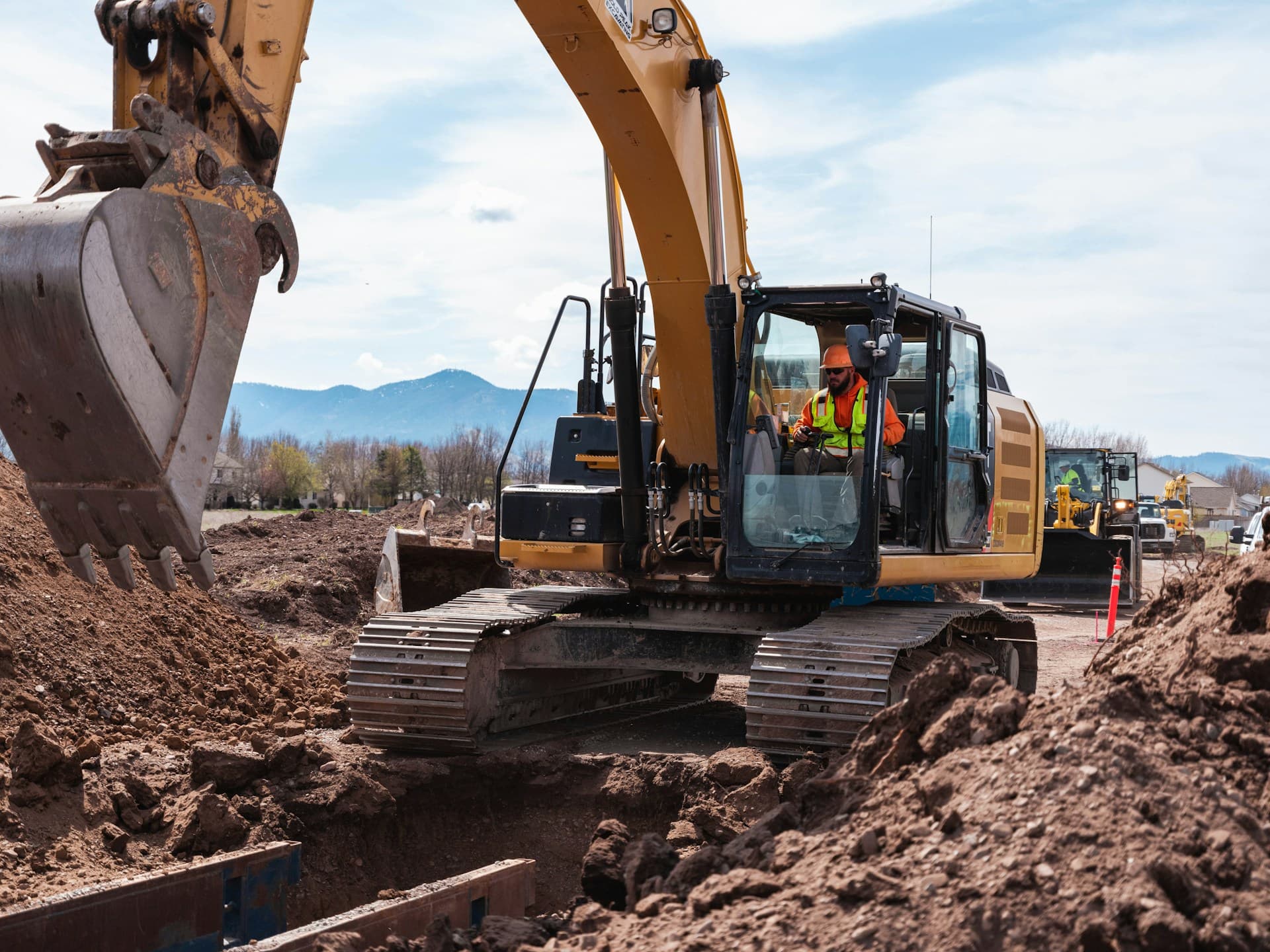 Excavator operator working on an Australian construction site